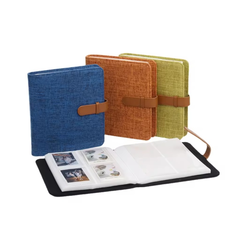 Pikxi Simple Design 288 Pocket Linen Photo Album Book for Instax Mini 12/11/EVO/Liplay Film with Leather Strap – Available in Black, Blue, Green, and Orange Colors